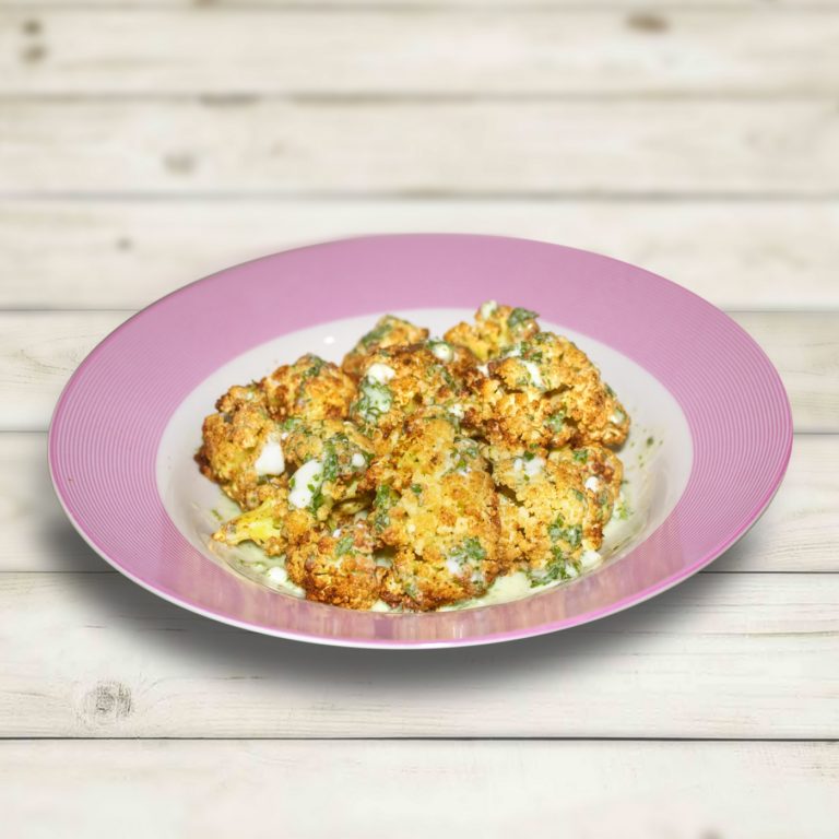 CURRY-ROASTED CAULIFLOWER WITH MINTY YOGURT SAUCE